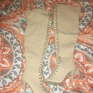 Thigh high lace up boots